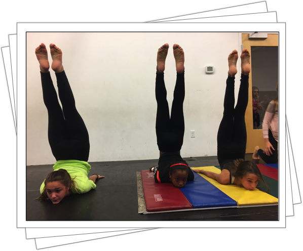 Working hard in Acro Class!